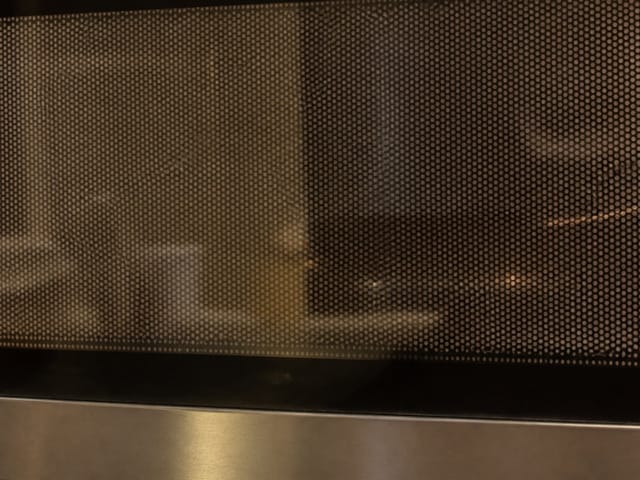 Close-up of a microwave door