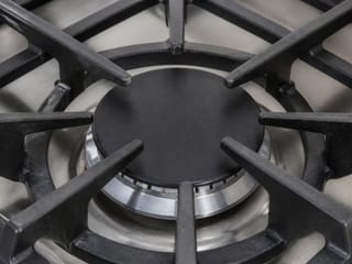 Close-up of a gas stovetop grate